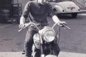 Man on a motor bike in the 1960s